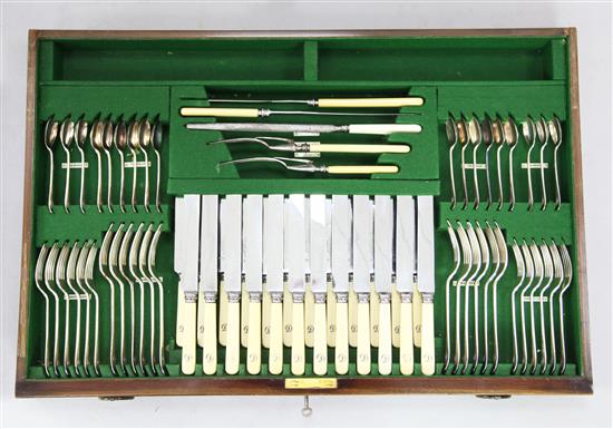 An early 20th century part canteen of silver plated Hanovarian pattern cutlery, width 33in.